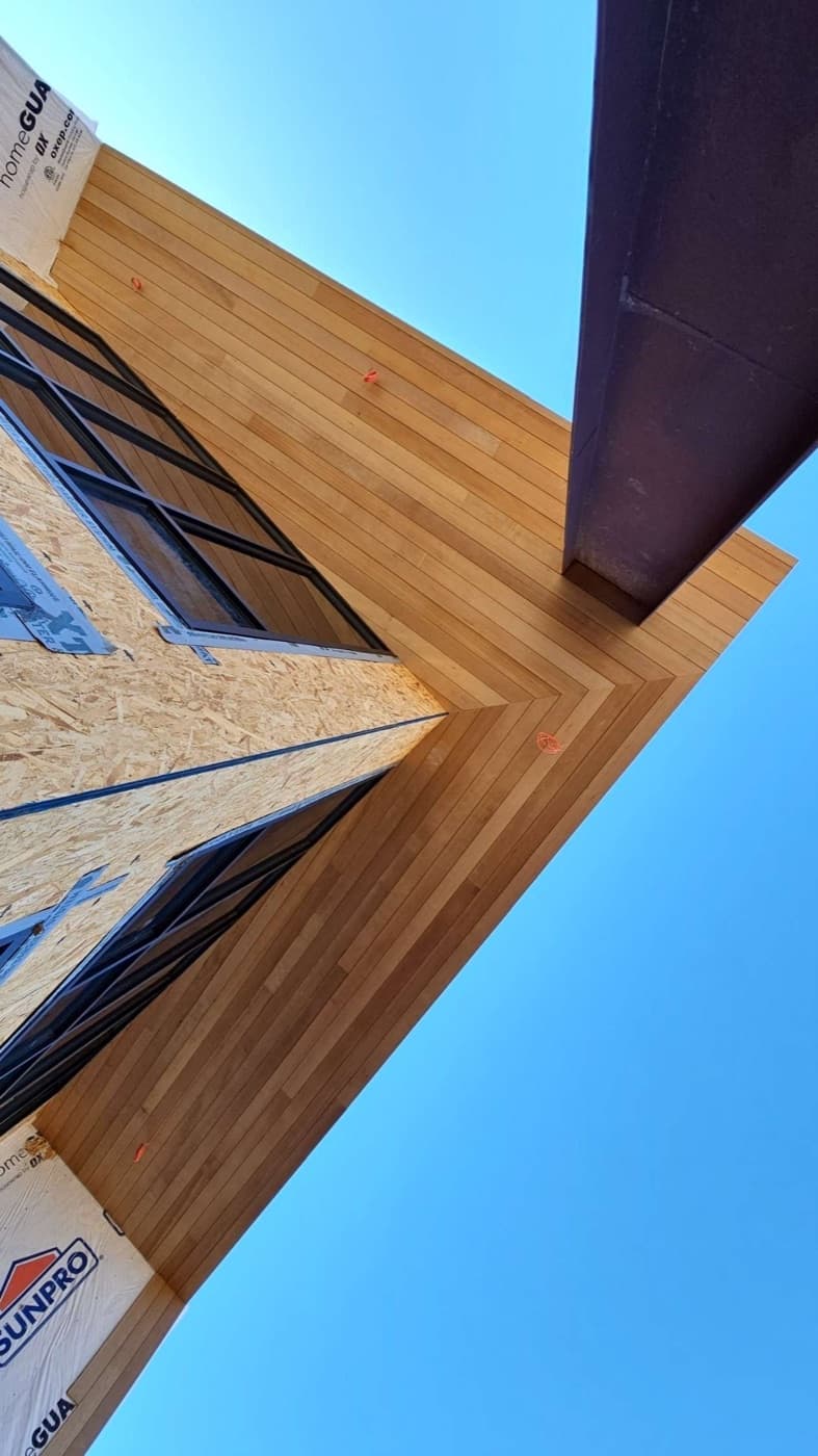 Precision framing corner against a blue sky